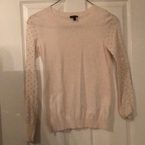 Tan sweater with gold beading on sleeves